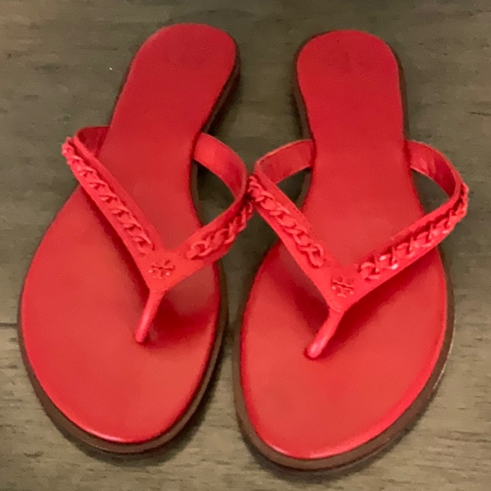 Luxe leather & fun red color make this Tory Burch pair a must. Worn only once!!